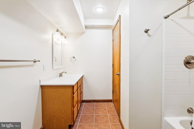 6364 Evangeline Ln, Alexandria, VA 22312 - bathroom featuring vanity, washtub / shower combination, tile patterned flooring, and baseboards