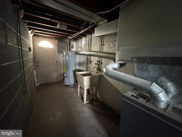6641 Gillespie St, Philadelphia, PA 19135 - unfinished basement with a sink and gas water heater