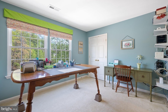home office featuring baseboards, visible vents, and carpet flooring