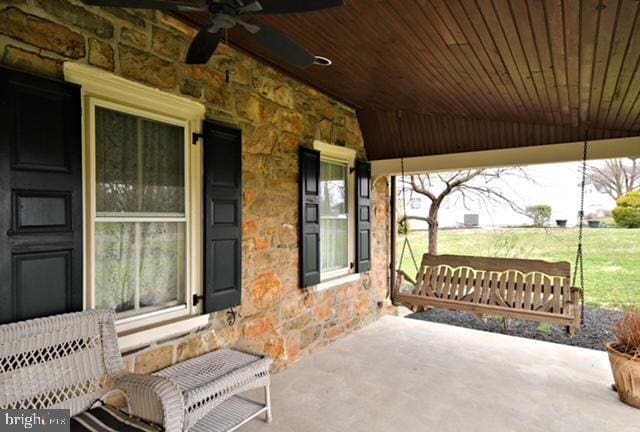 view of patio featuring ceiling fan and covered porch