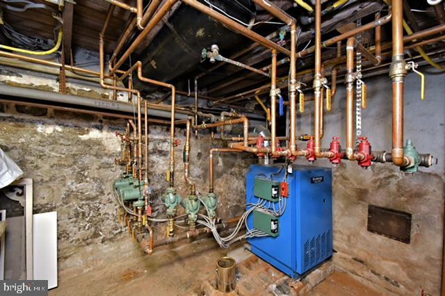 utility room with a heating unit