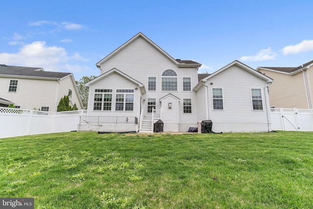 41430 Whimsical Ct, Leonardtown, MD 20650 - back of property with a gate, a yard, and a fenced backyard