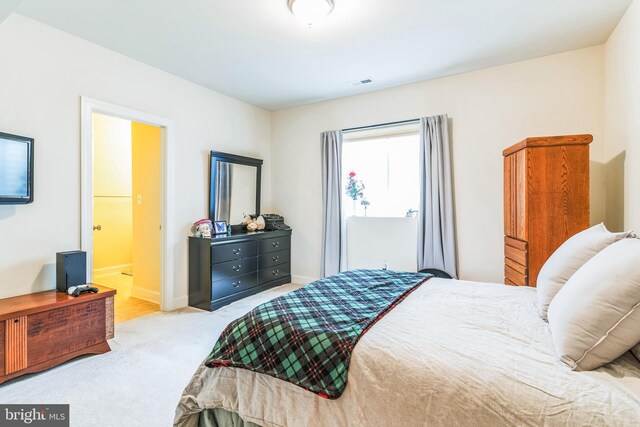 41430 Whimsical Ct, Leonardtown, MD 20650 - bedroom with carpet floors, visible vents, baseboards, and connected bathroom