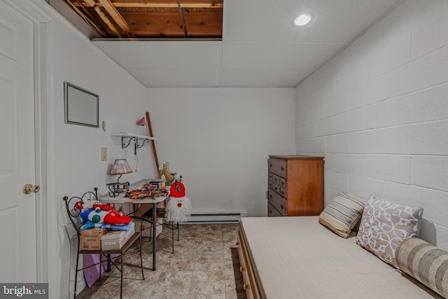 384 Meandering Ln, Hedgesville, WV 25427 - bedroom featuring a baseboard radiator and concrete block wall