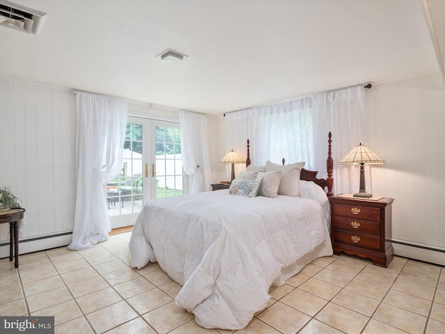 bedroom featuring light tile patterned flooring, access to outside, french doors, a baseboard radiator, and visible vents