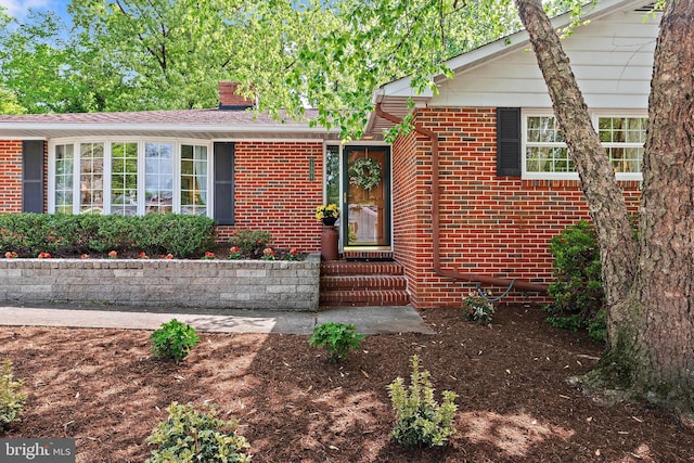 view of front of property with brick siding