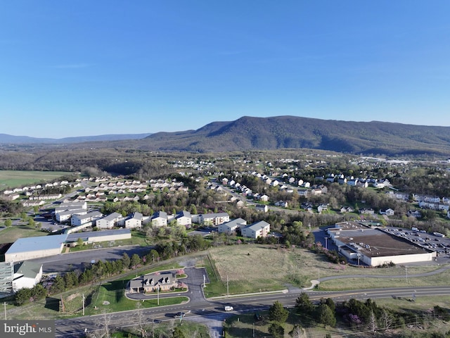 birds eye view of property featuring a mountain view and a residential view
