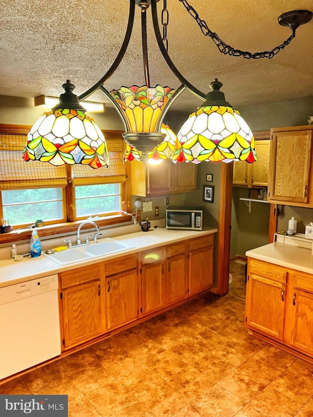3080 Beautiful Run Rd, Orange, VA 22960 - kitchen with dishwasher, stainless steel microwave, a textured ceiling, a sink, and light countertops