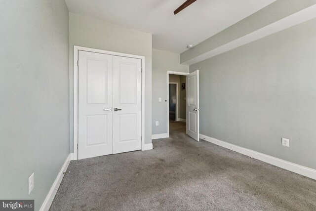 2519 Reisterstown Rd, Baltimore, MD 21217 - unfurnished bedroom with carpet floors, a closet, and baseboards