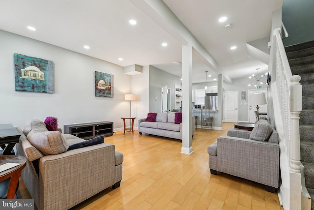 2519 Reisterstown Rd, Baltimore, MD 21217 - living room with stairway, light wood-style flooring, recessed lighting, and baseboards
