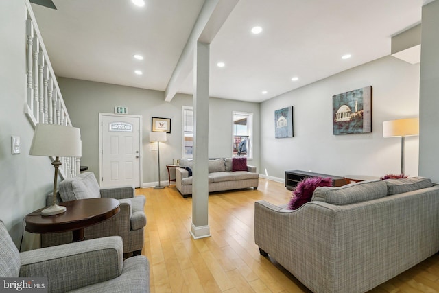 2519 Reisterstown Rd, Baltimore, MD 21217 - living area featuring light wood-type flooring, recessed lighting, baseboards, and stairway