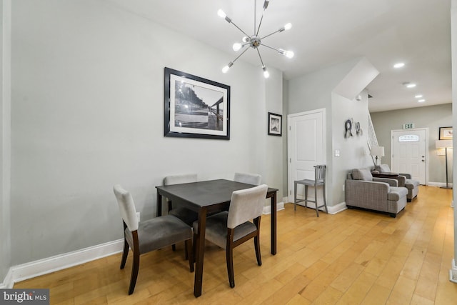 2519 Reisterstown Rd, Baltimore, MD 21217 - dining room with a chandelier, baseboards, light wood-style flooring, and recessed lighting