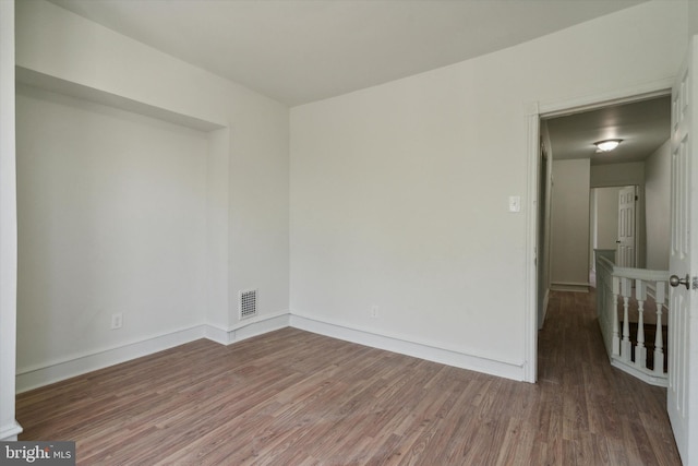 5449 Race St, Philadelphia, PA 19139 - unfurnished room featuring visible vents, baseboards, and wood finished floors