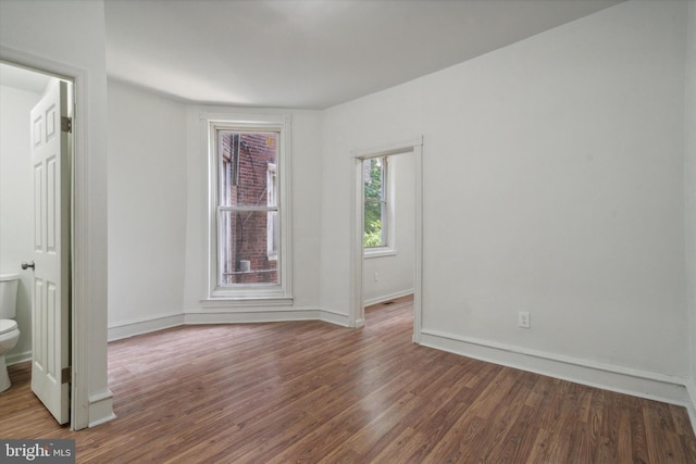 5449 Race St, Philadelphia, PA 19139 - empty room with baseboards and wood finished floors