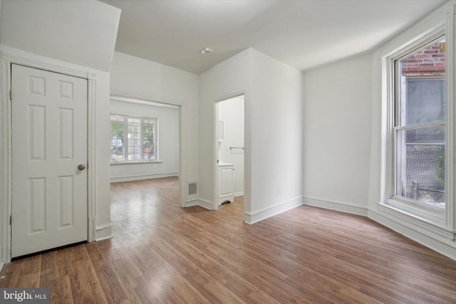 5449 Race St, Philadelphia, PA 19139 - empty room with baseboards and wood finished floors