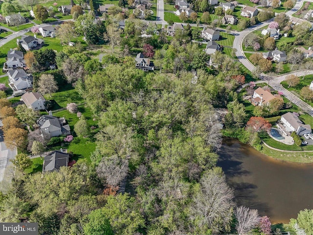 aerial view with a residential view and a water view