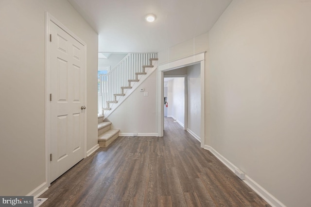 424 S Van Buren St, Wilmington, DE 19805 - hallway with dark wood-style flooring, stairway, and baseboards