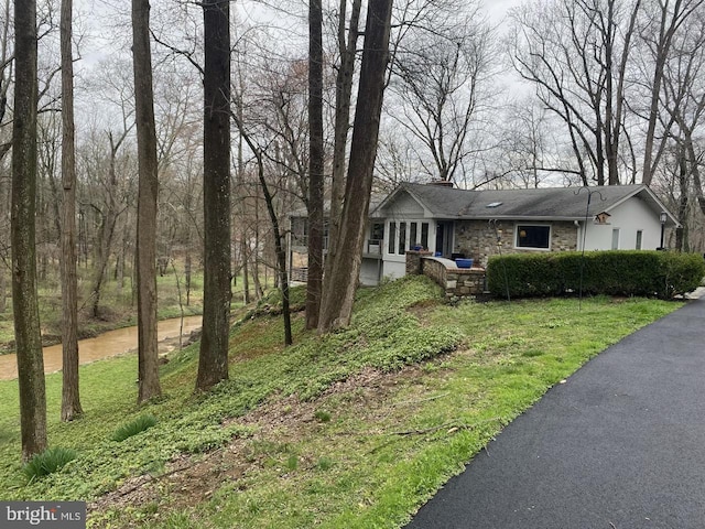 view of front of home with a front yard