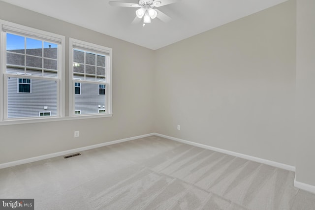 42482 Benfold Sq, Ashburn, VA 20148 - unfurnished room with baseboards, light carpet, and ceiling fan