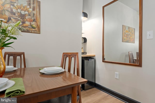 dining room with wood finished floors