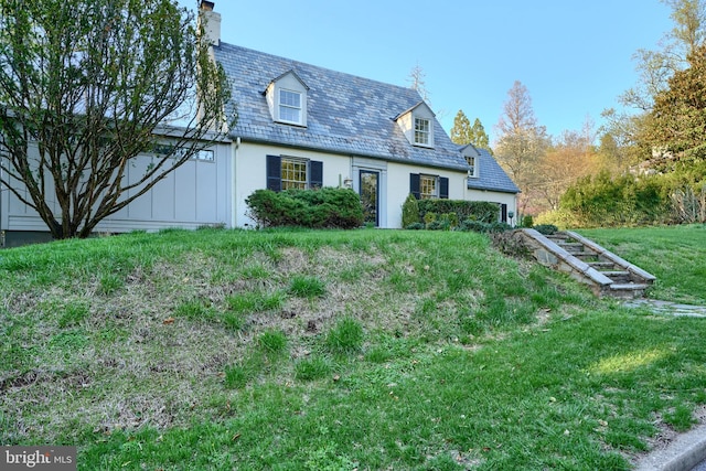 1122 Bellemore Rd, Baltimore, MD 21210 - cape cod house with a front yard, a high end roof, and a chimney