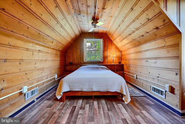1122 Bellemore Rd, Baltimore, MD 21210 - bedroom with vaulted ceiling, visible vents, wood ceiling, wood finished floors, and wooden walls