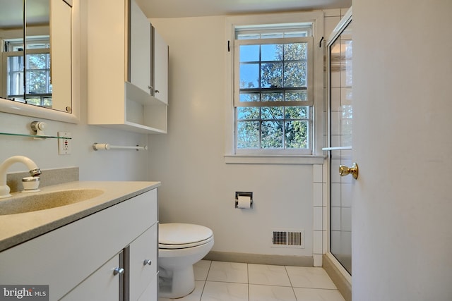 1122 Bellemore Rd, Baltimore, MD 21210 - full bathroom with a wealth of natural light, vanity, and toilet
