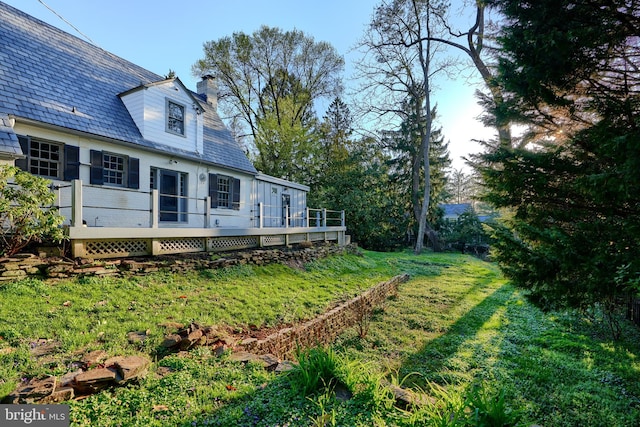 1122 Bellemore Rd, Baltimore, MD 21210 - view of yard with a wooden deck