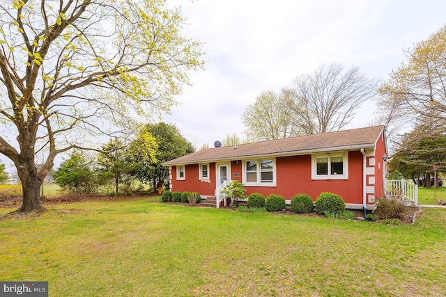26039 Hidden Acres Ln, Millsboro, DE 19966 - ranch-style home with a front yard and stucco siding