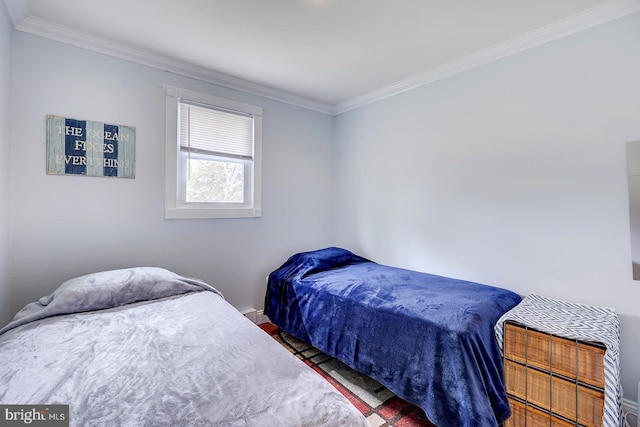 26039 Hidden Acres Ln, Millsboro, DE 19966 - bedroom with baseboards, ornamental molding, and wood finished floors