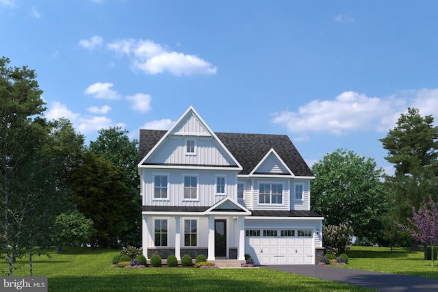 view of front facade with board and batten siding, a front yard, an attached garage, a shingled roof, and driveway