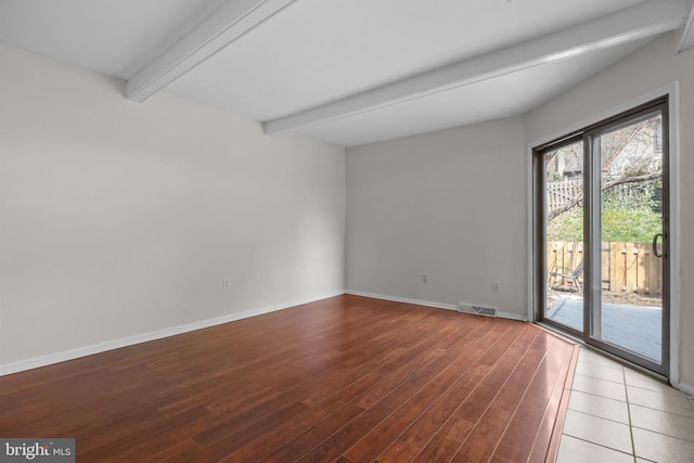 3 Bennington Pl, Newtown, PA 18940 - spare room featuring wood finished floors, beamed ceiling, baseboards, and visible vents
