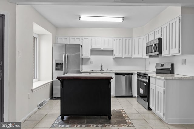 3 Bennington Pl, Newtown, PA 18940 - kitchen featuring visible vents, light countertops, white cabinetry, and appliances with stainless steel finishes