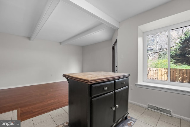 3 Bennington Pl, Newtown, PA 18940 - kitchen with plenty of natural light, visible vents, dark cabinetry, and beam ceiling