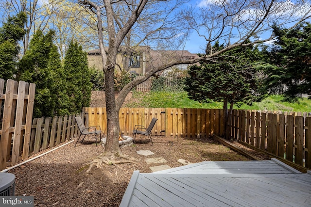 3 Bennington Pl, Newtown, PA 18940 - view of yard featuring an outdoor fire pit, a fenced backyard, and a deck