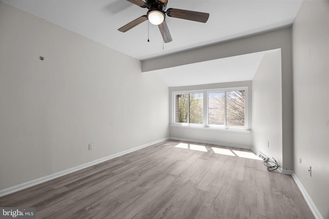 3 Bennington Pl, Newtown, PA 18940 - spare room with wood finished floors, baseboards, a ceiling fan, and vaulted ceiling
