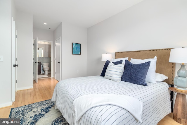 3883 Connecticut Ave NW Unit 909, Washington, DC 20008 - bedroom with light wood finished floors, ensuite bathroom, and recessed lighting