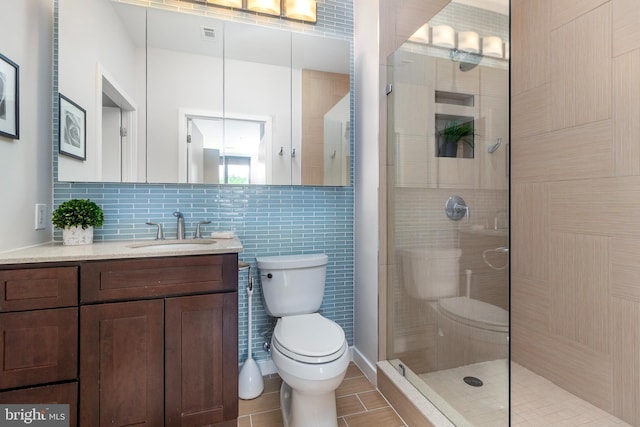 3883 Connecticut Ave NW Unit 909, Washington, DC 20008 - full bath featuring tiled shower, toilet, vanity, tile patterned floors, and tasteful backsplash