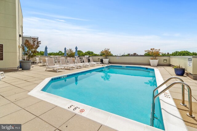 3883 Connecticut Ave NW Unit 909, Washington, DC 20008 - community pool featuring a patio