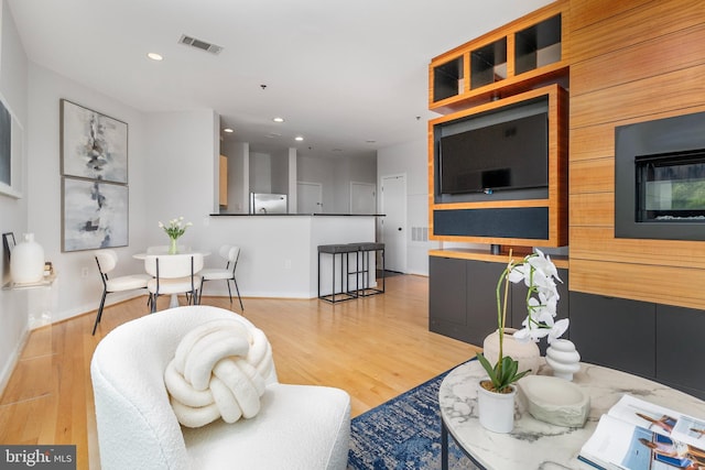 3883 Connecticut Ave NW Unit 909, Washington, DC 20008 - living area with wood finished floors, recessed lighting, and baseboards