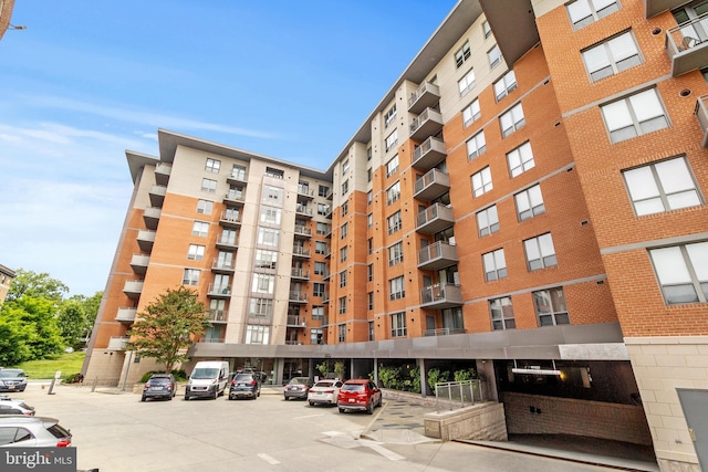 3883 Connecticut Ave NW Unit 909, Washington, DC 20008 - view of apartment building / complex with uncovered parking