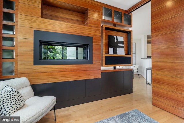 3883 Connecticut Ave NW Unit 909, Washington, DC 20008 - living area with wood finished floors and wooden walls