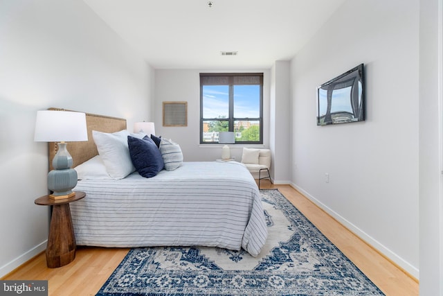 3883 Connecticut Ave NW Unit 909, Washington, DC 20008 - bedroom with wood finished floors and baseboards