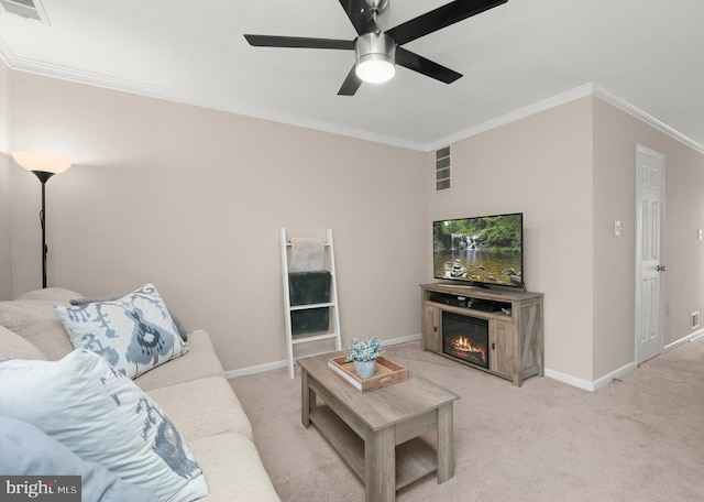 living room featuring ornamental molding, visible vents, baseboards, and light carpet