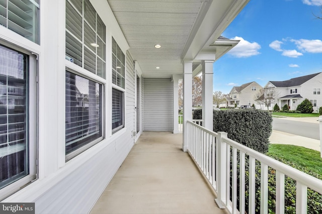 balcony with a porch and a residential view