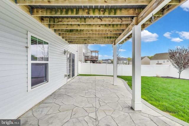 view of patio with fence