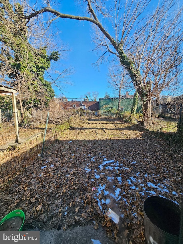 view of yard with fence