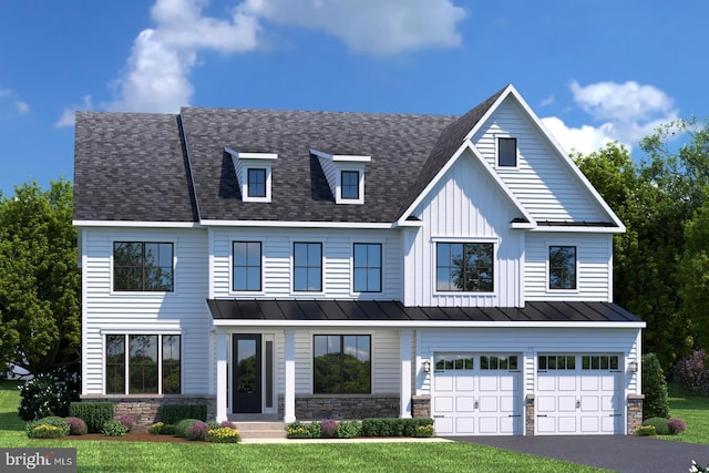 view of front facade featuring a standing seam roof, metal roof, driveway, and stone siding