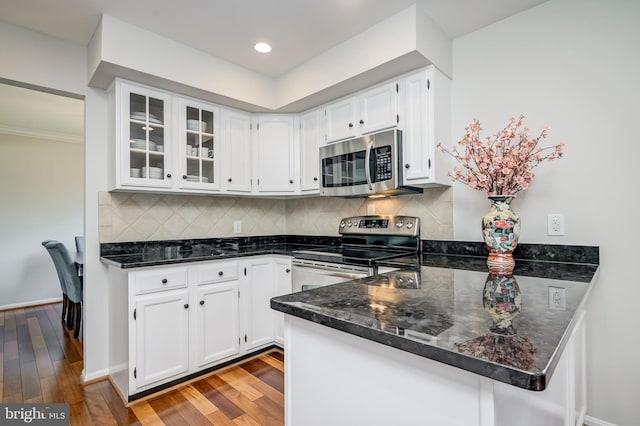 10 Fullview Ct, Gaithersburg, MD 20878 - kitchen with dark stone countertops, wood finished floors, glass insert cabinets, stainless steel appliances, and white cabinets