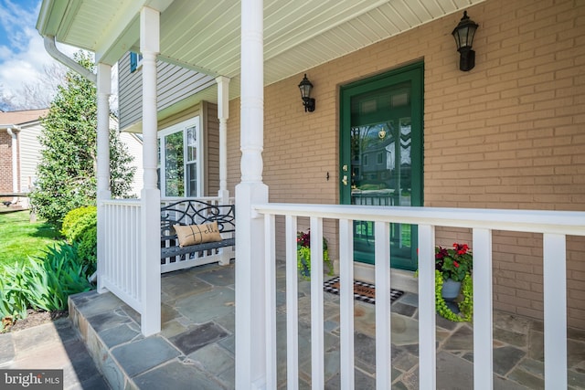10 Fullview Ct, Gaithersburg, MD 20878 - property entrance featuring a porch and brick siding